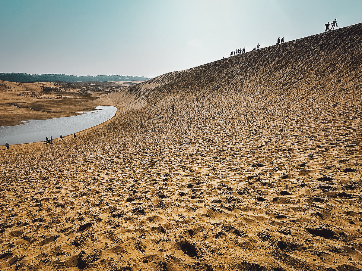 People playing in Tottori's sand dunes