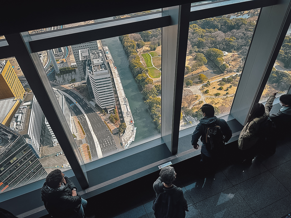 People enjoying the view from Caretta Shiodome Sky View
