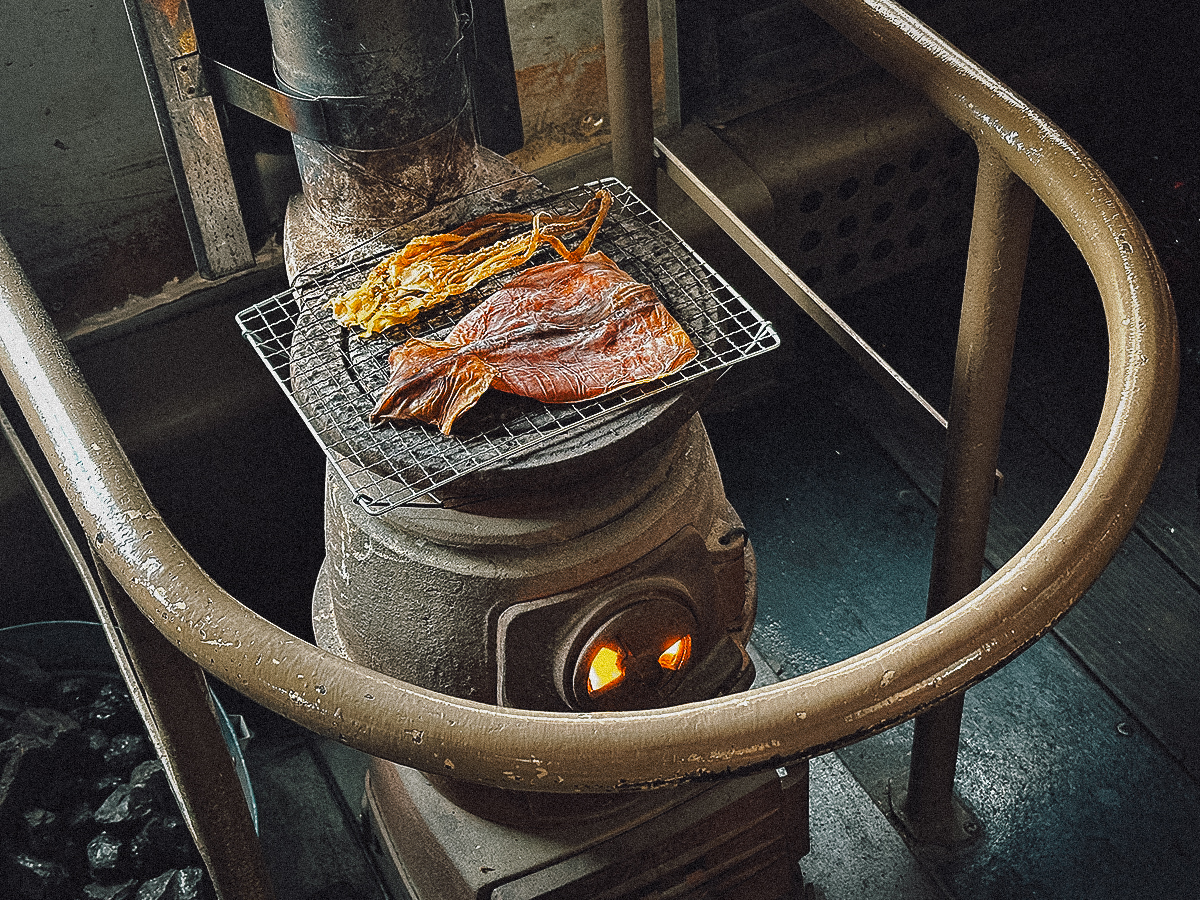 Dried squid grilling on the stove