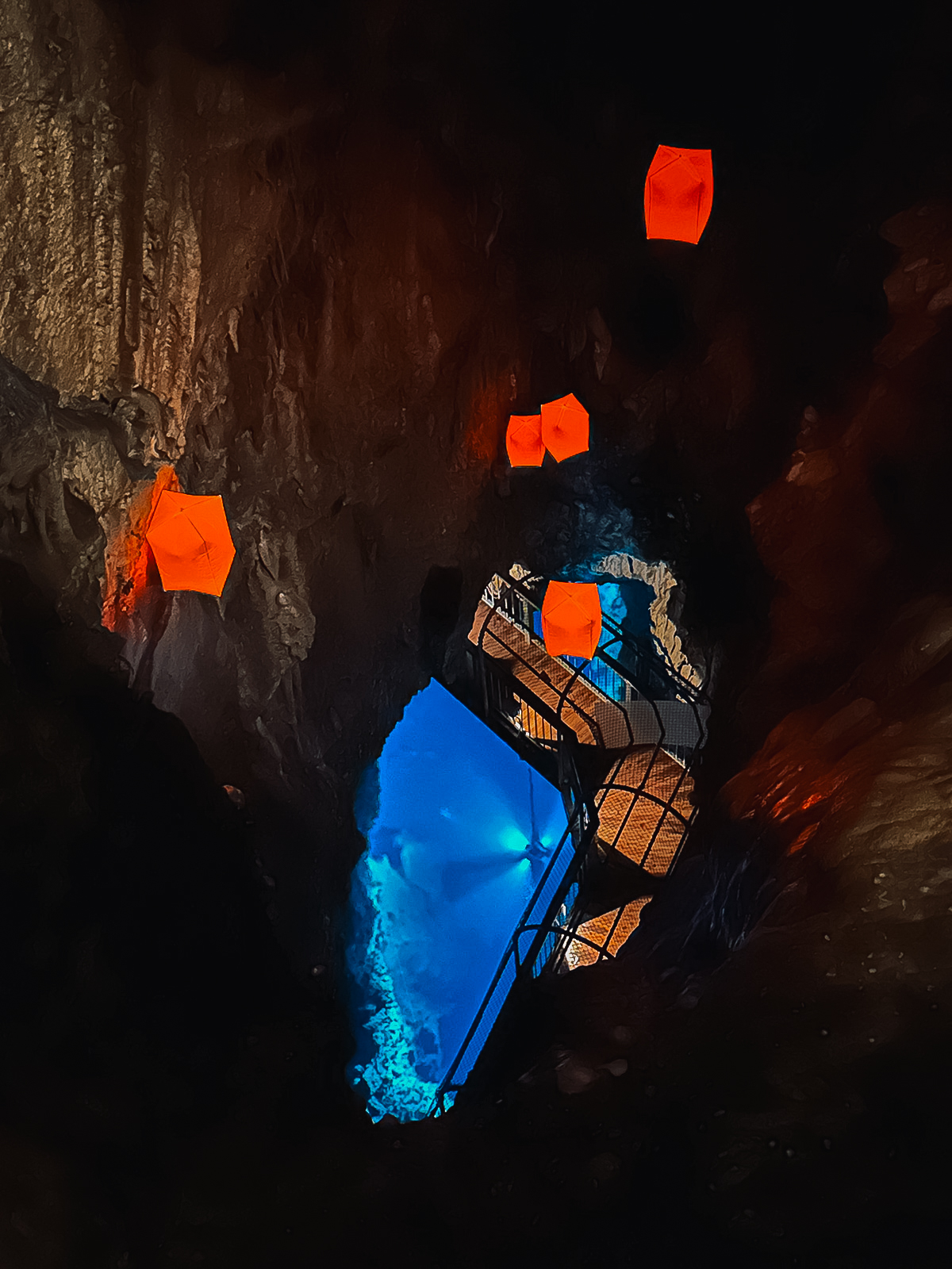 Hanging lanterns over the underground lake