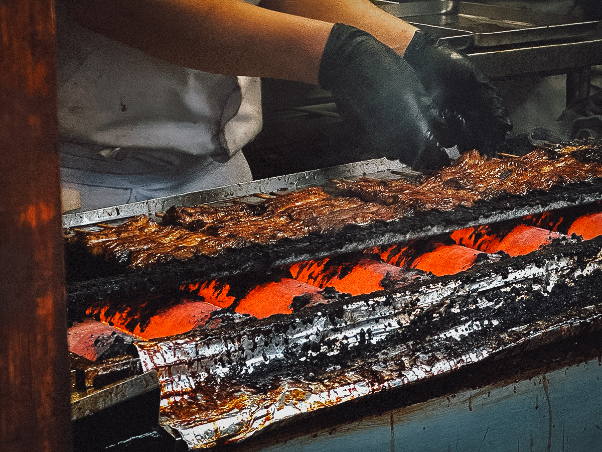 Narita Travel Guide Cook grilling unagi
