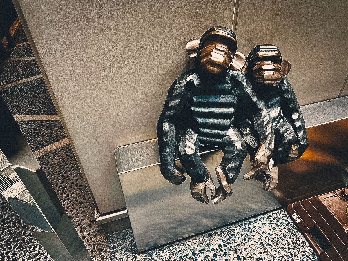 Modern sculpture of two monkeys